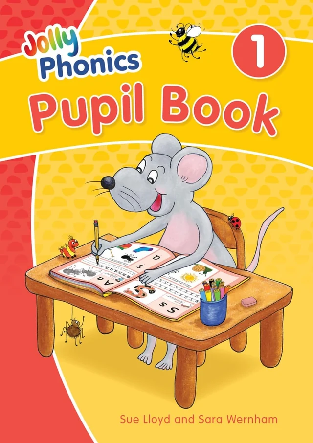 Jolly Phonics Pupil Book 1 cover by Sue Lloyd and Sara Wernham showing a mouse writing at a desk: the first Jolly Phonics write-in book, teaching the 42 main letter sounds, simple words and the first tricky words